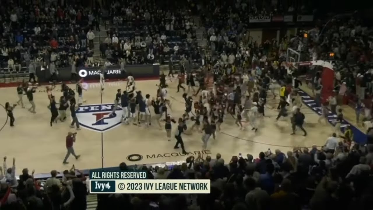 Penn UPSETS #21 Villanova and fans storm the court