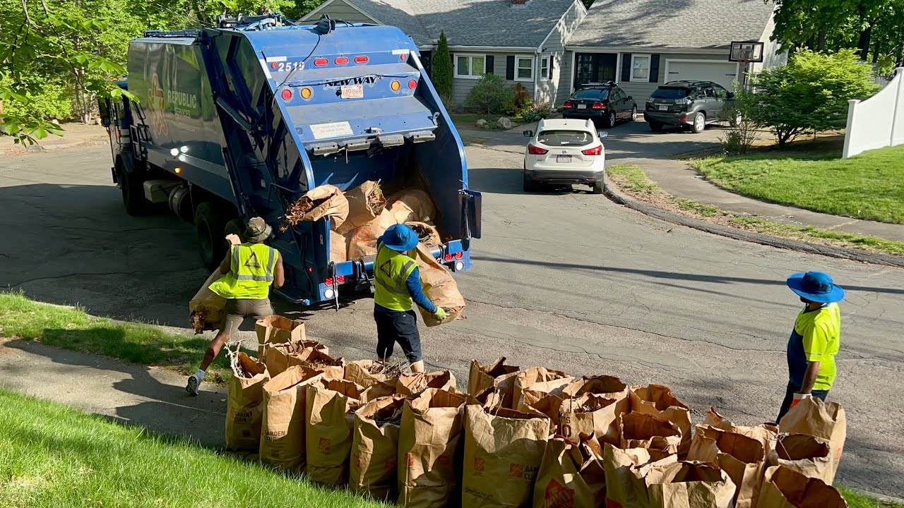 Republic Services Garbage Truck Packing Massive Leaf Bag Lines