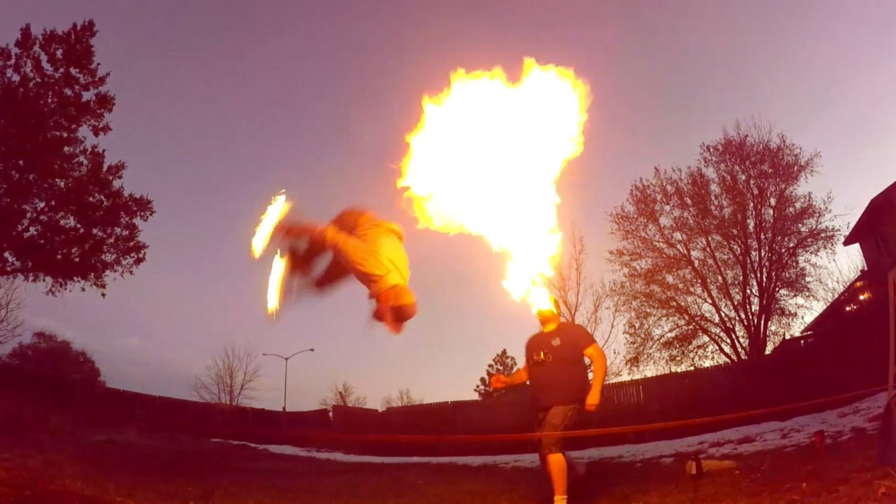 Backflip On Slackline While Feet Are On Fire