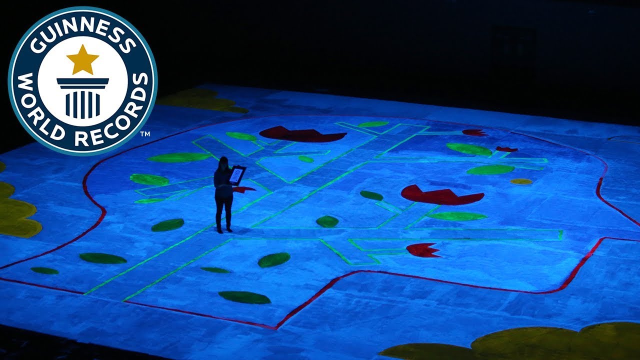 Largest UV blacklight painting- Guinness World Records Day 2018