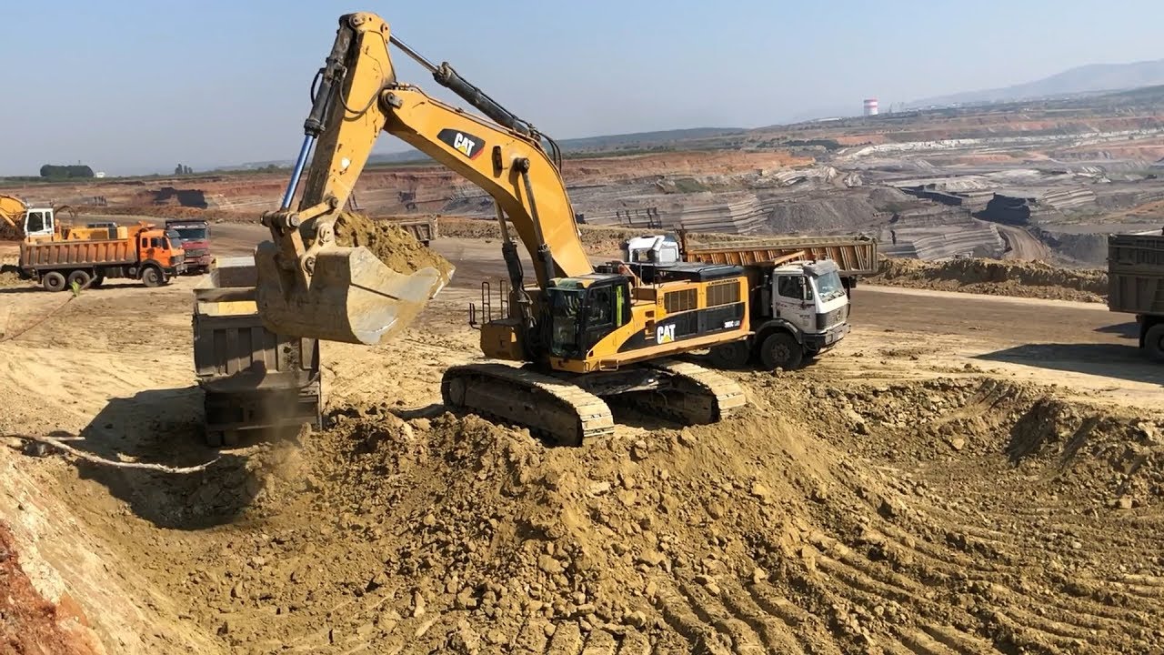 Caterpillar 385C Excavator Loading Mercedes And MAN Trucks - Labrianidis Mining Works