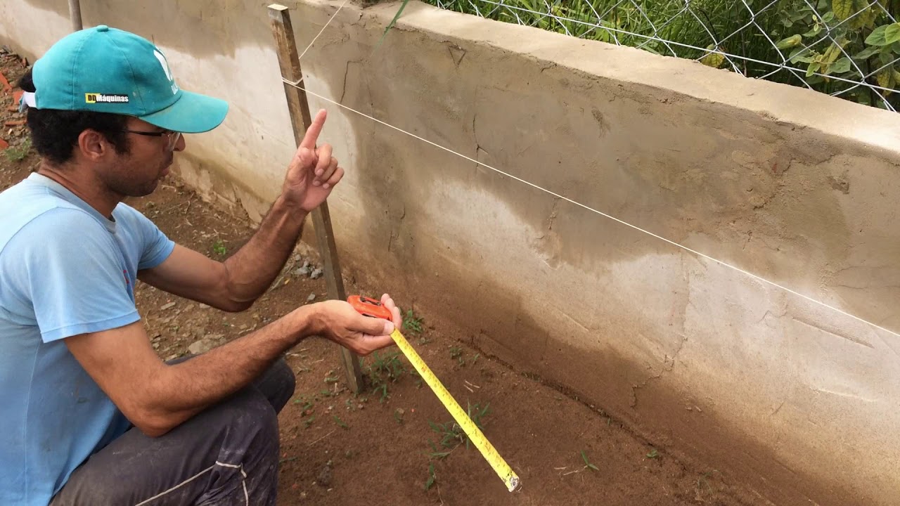 Como tirar nivel do terreno pra construir nivelado qual lado é o mais baixo pra dar queda