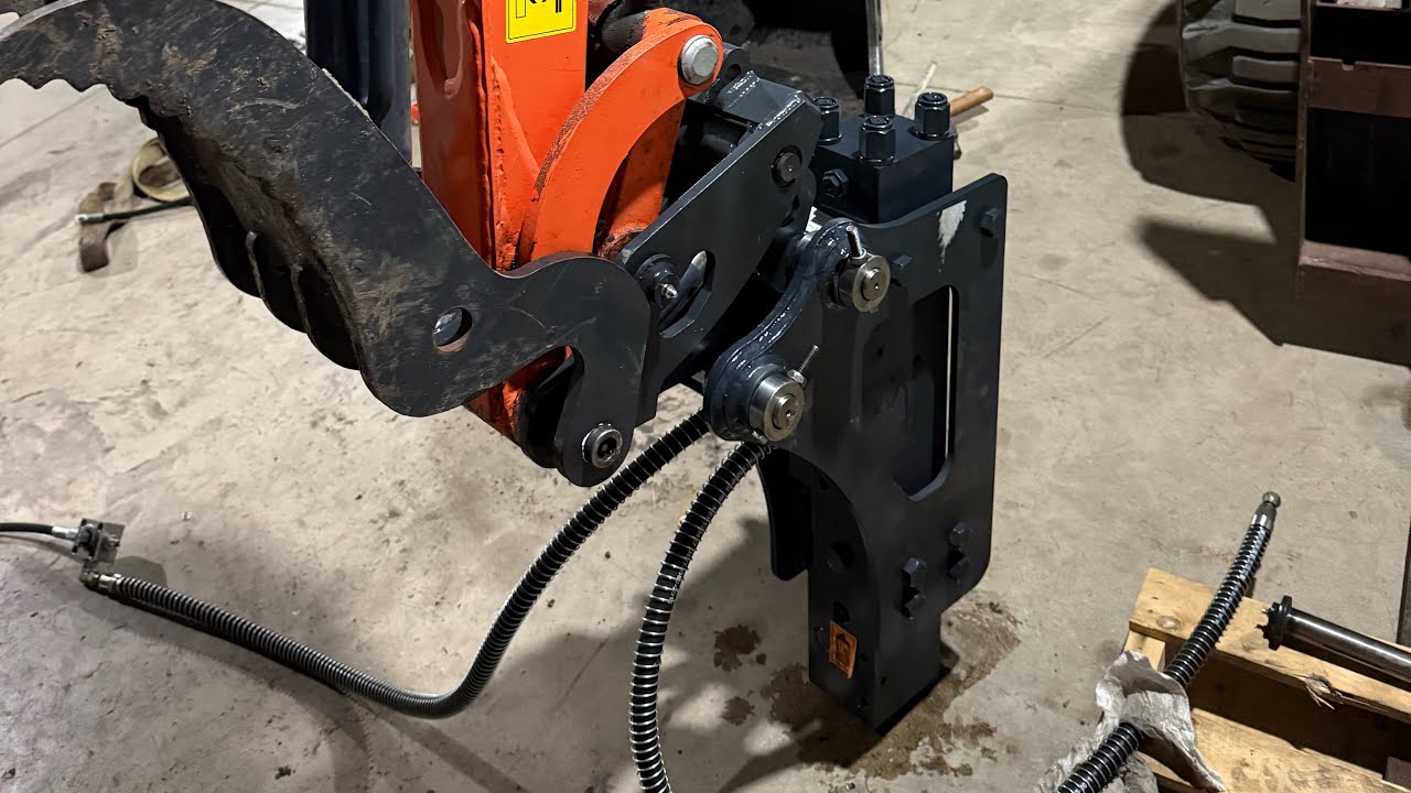 Chinese excavator get a Concrete Breaker  