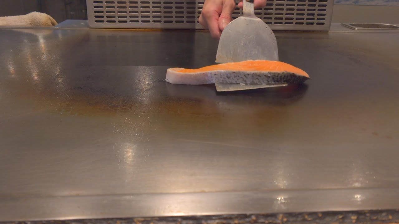 Teppanyaki seafood - salmon, shrimps with special sauce and fried squid.