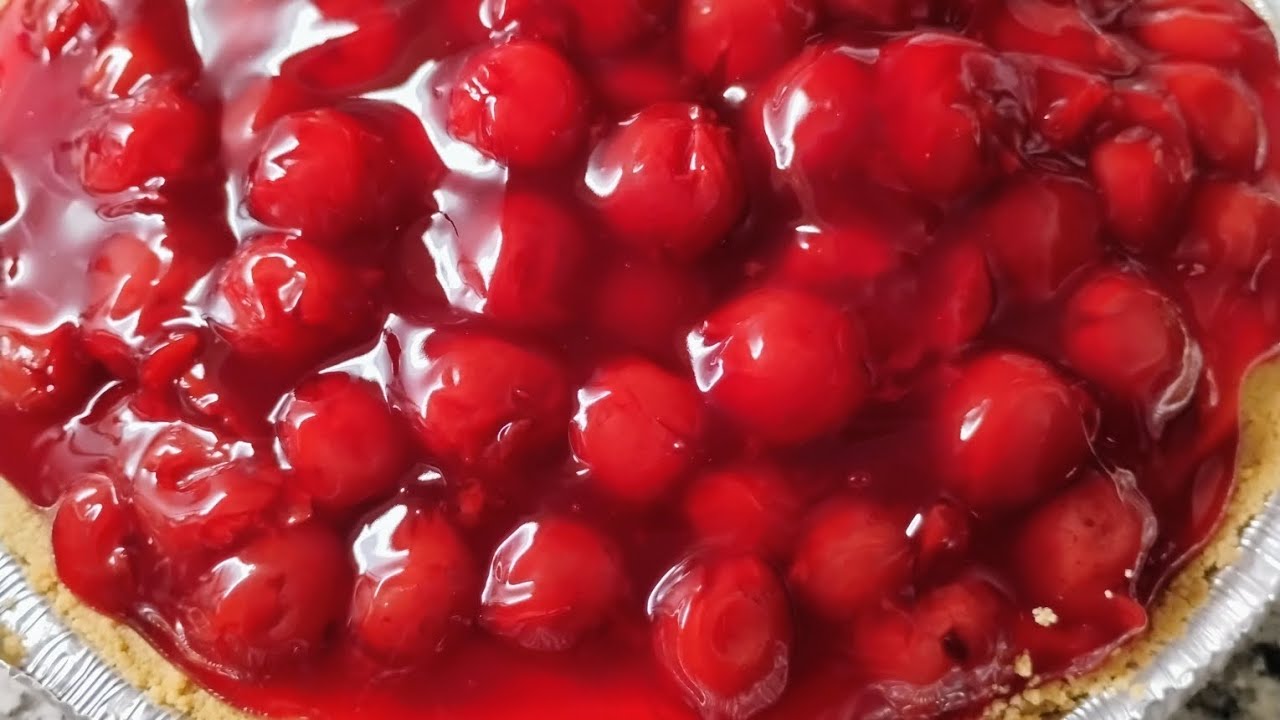 Lemonade-Kool Aid Cheesecake w/ Cherry Topping