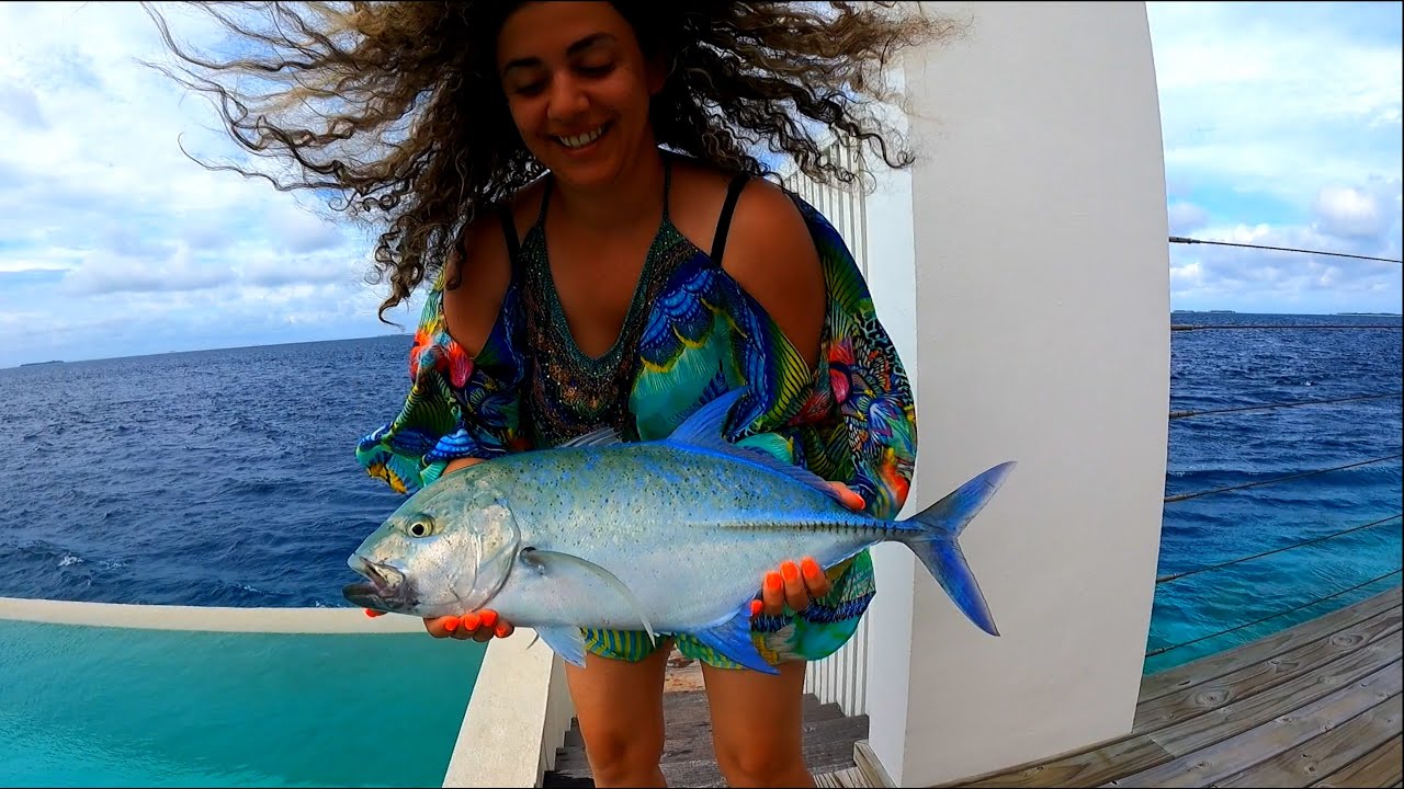 Fishing from a Swimming Pool in Maldives