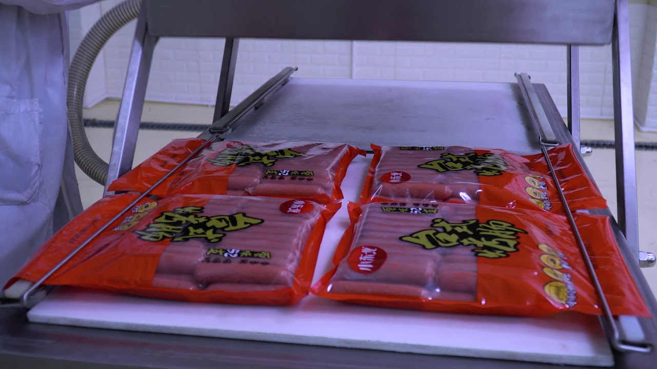 Sausage vacuum packing machine