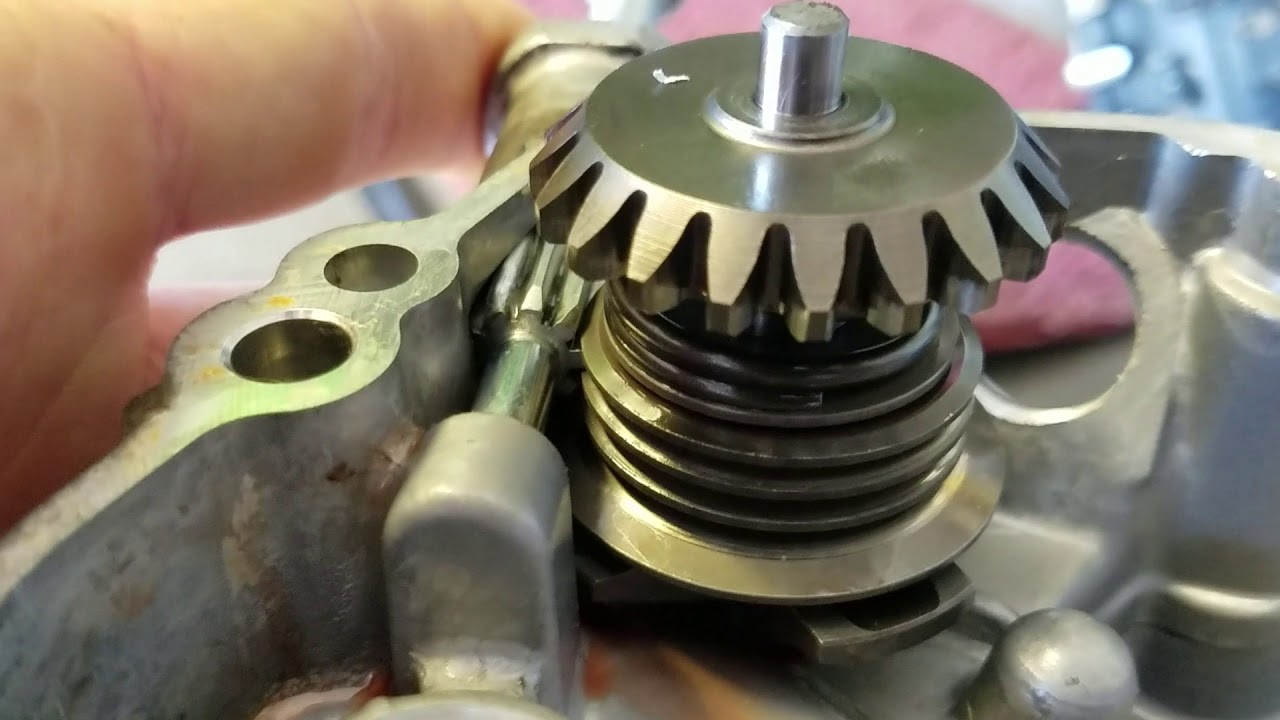 2003 KX100 power valve / governor shaft and water pump shaft