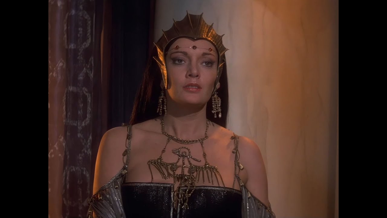 Sarah Douglas as Queen Taramis in 