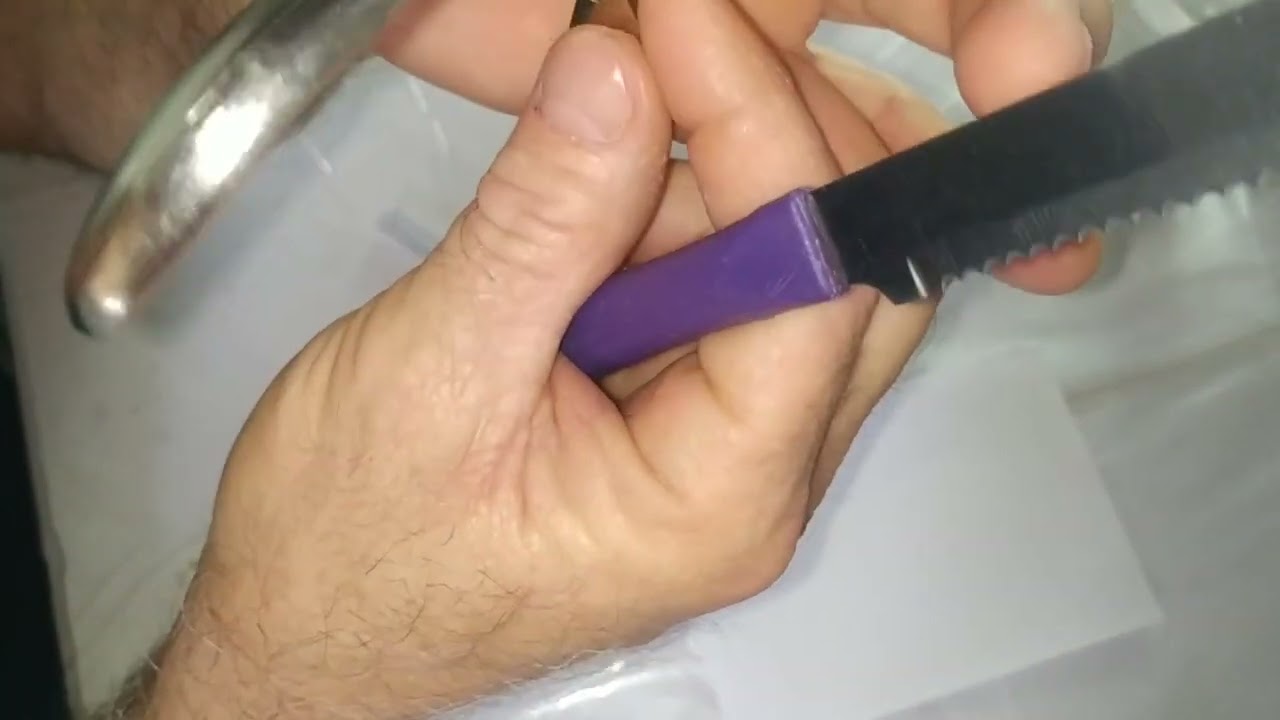 como afiar alicate de cutícula  usando uma faca - Assista o vídeo
