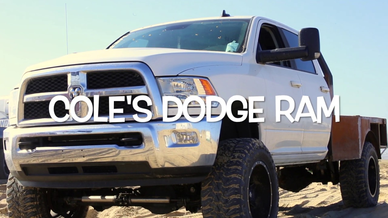 DODGE RAM AT PISMO BEACH (PULLING STUCK TRUCKS IN THE SAND).