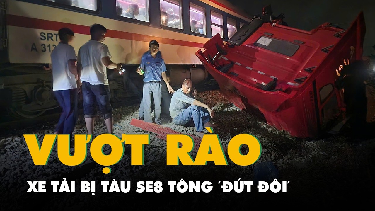 Tàu SE8 tông 'đứt đôi' xe tải vượt rào chắn mắc kẹt ở đường ray