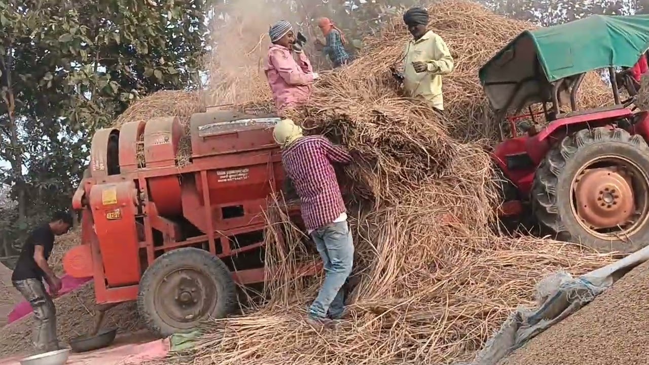 धान झरने की मशीन