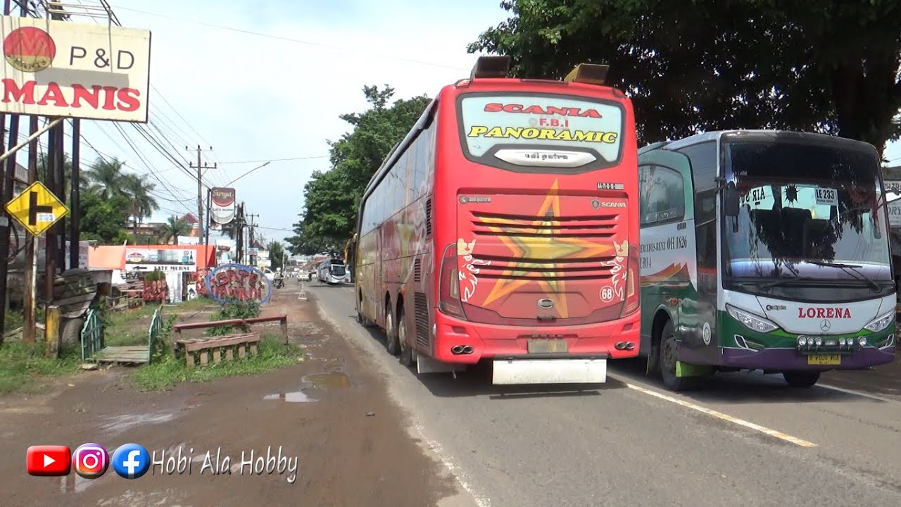 BUS-BUS TERPANTAU MELINTAS DI KM.11 PALEMBANG