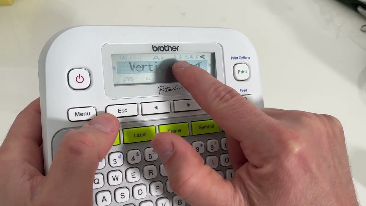 Как печатать вертикальный текст с помощью принтера Brother Label Maker