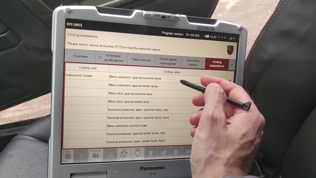 How to adjust the TPMS warning level in a Porsche 997