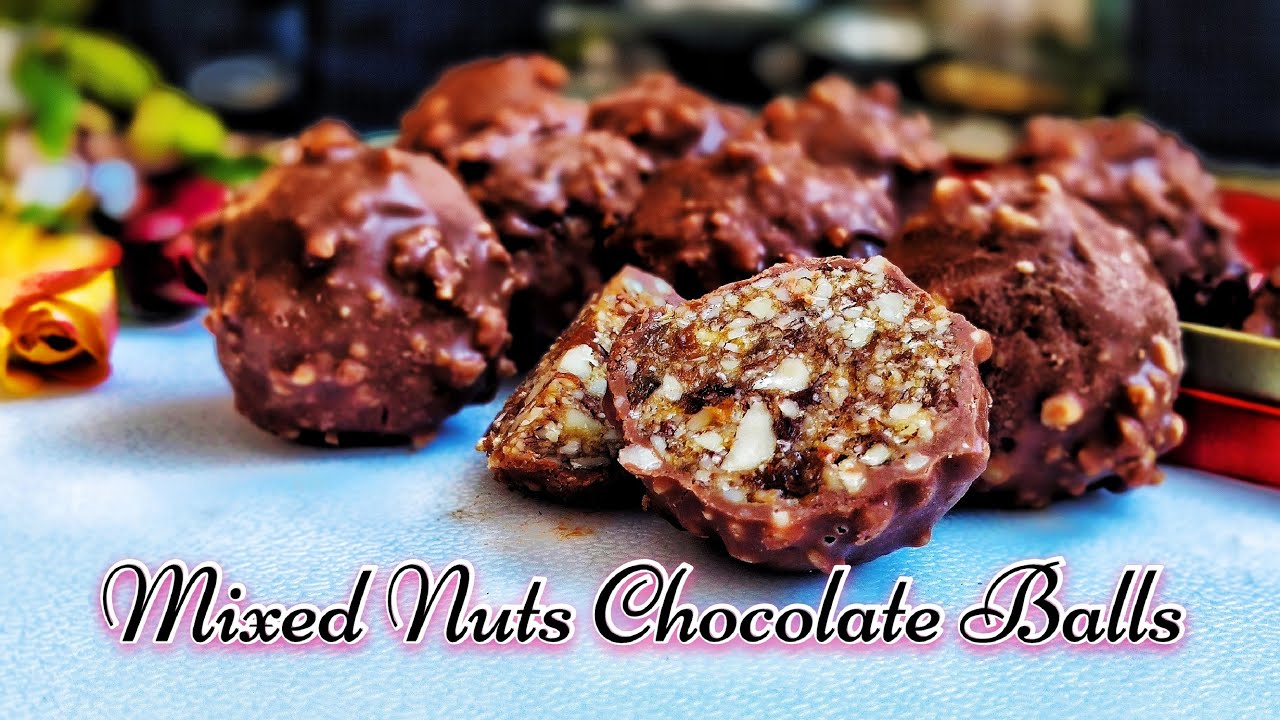 Mixed Nuts Chocolate Balls 坚果巧克力球：由杏仁等坚果制作的巧克力球糖，香醇美味、非常好吃，老少皆宜，也是节日馈亲赠友的好礼品，做法超级简单零失败。