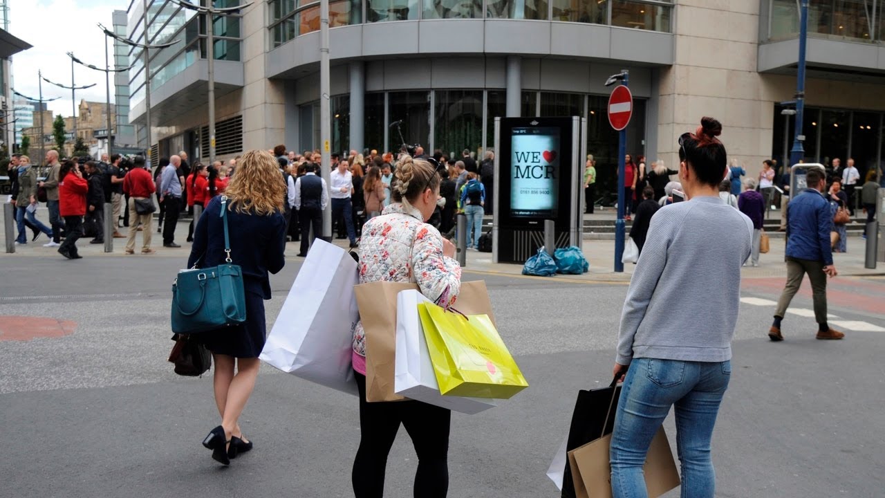 Man arrested after five stabbed outside a Manchester shopping centre