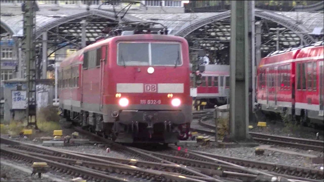 Zugverkehr auf der Kölner Hohenzollernbrücke und im Hbf