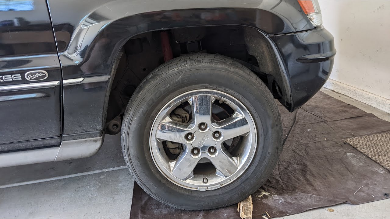 WJ budget boost - 2 inch spacer lift to clear 31s