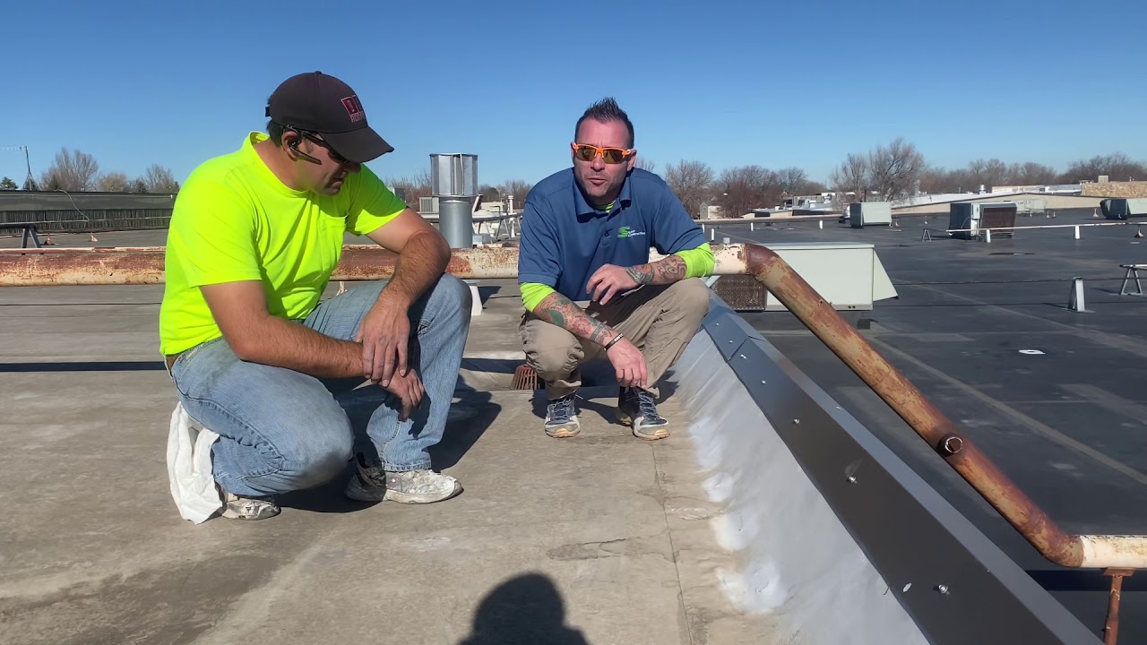 Hail Damage Roof Inspection on a Commercial Flat Roof TPO-EPDM in Ft Collins, CO Sauve Construction
