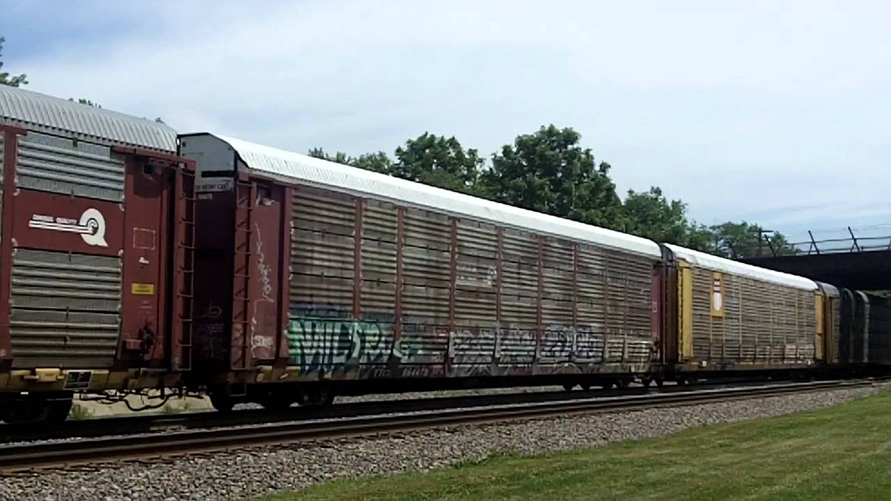 UP 8543 Leads Auto Train with DPU