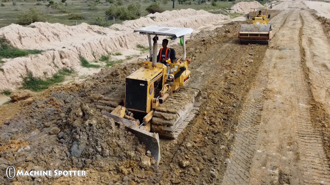 Bulldozer Komatsu D31P Spreading Dirt