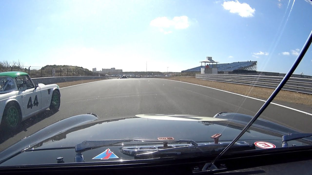 MGB vs Triumph TR4 Equipe GTS Zandvoort National Oldtimer Festival 28th July 2018 Race One