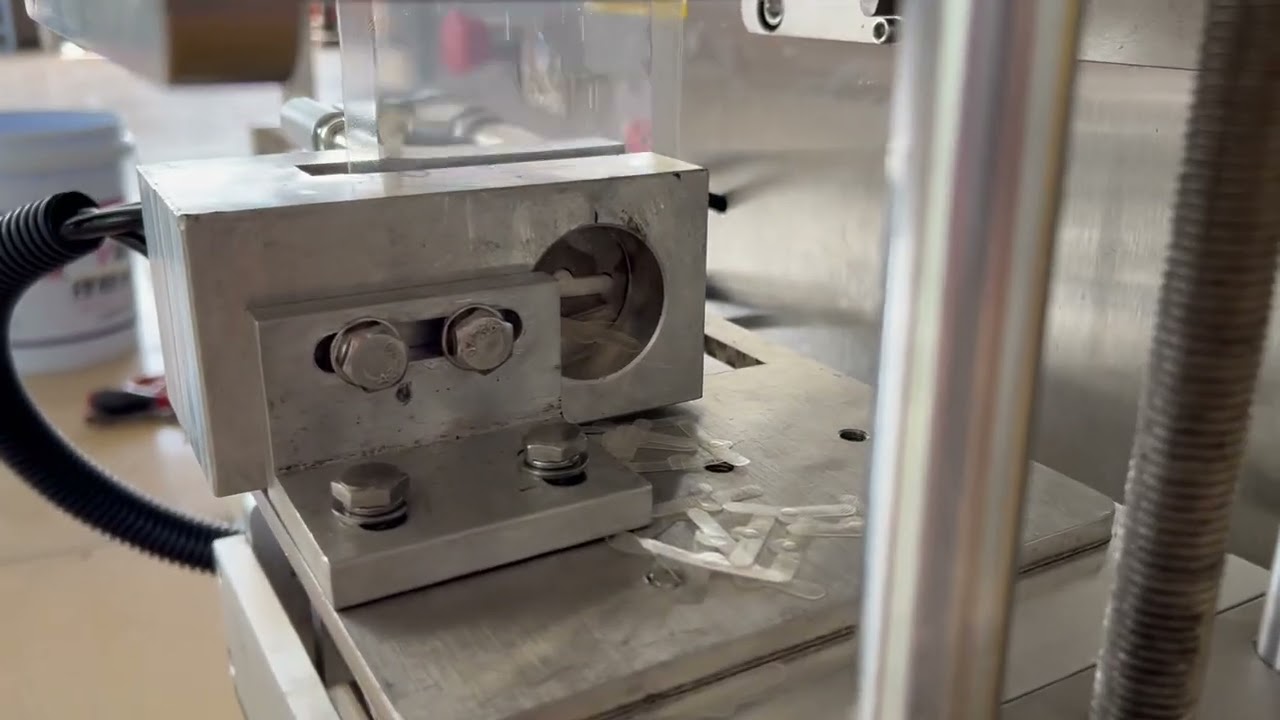 Four side sealing bag with hanging hole- liquid packing machine.