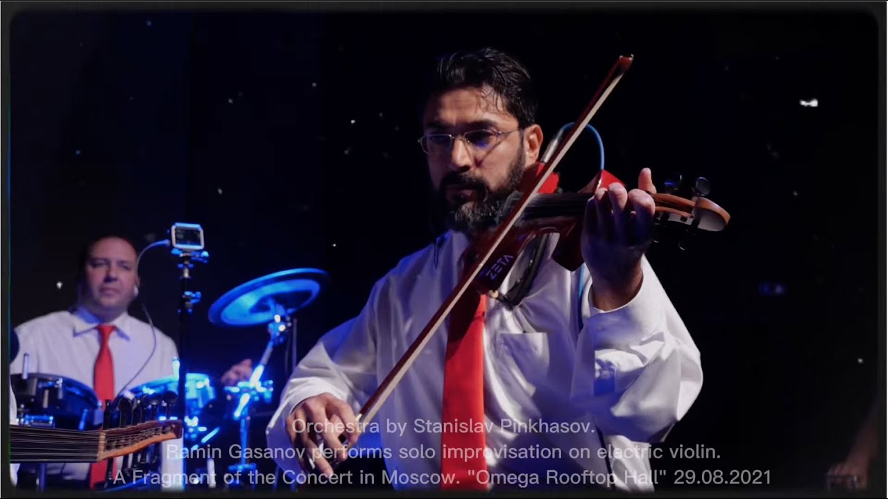 Orchestra by Stanislav Pinkhasov. Ramin Gasanov performs solo improvisation on electric violin.