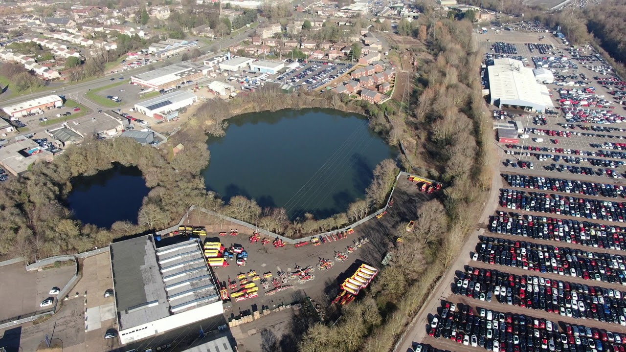 Corby town,railway station,the old clay holes and site of the old 'black hills'...