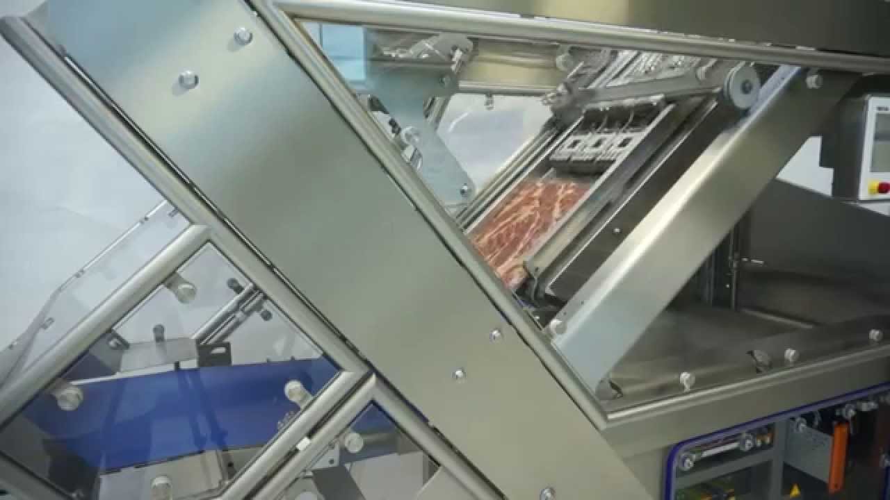 TEXTOR TS700-UB with semi-automatic loading for bulk bacon slicing