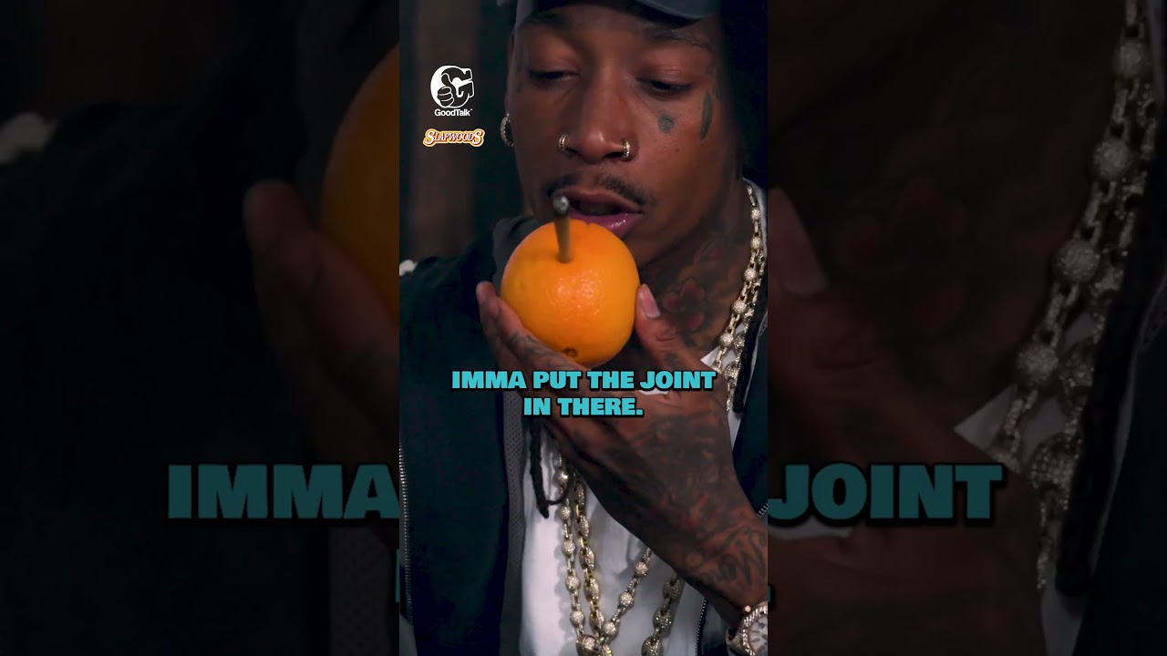 vertical smoking out an orange#shorts#thegoodtalkshow #goodtalkshow #wizkhalifa #podcast #edsheeran