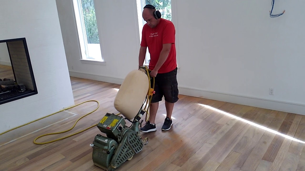 Solid hardwood floor sanding Kingdom Floors of Boca Raton inc.