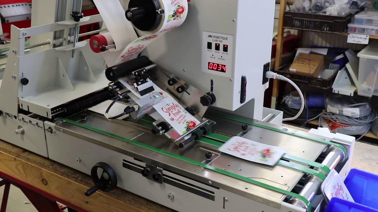 Automatic labeling of food pouches and flat zip lock pouches with LAB510