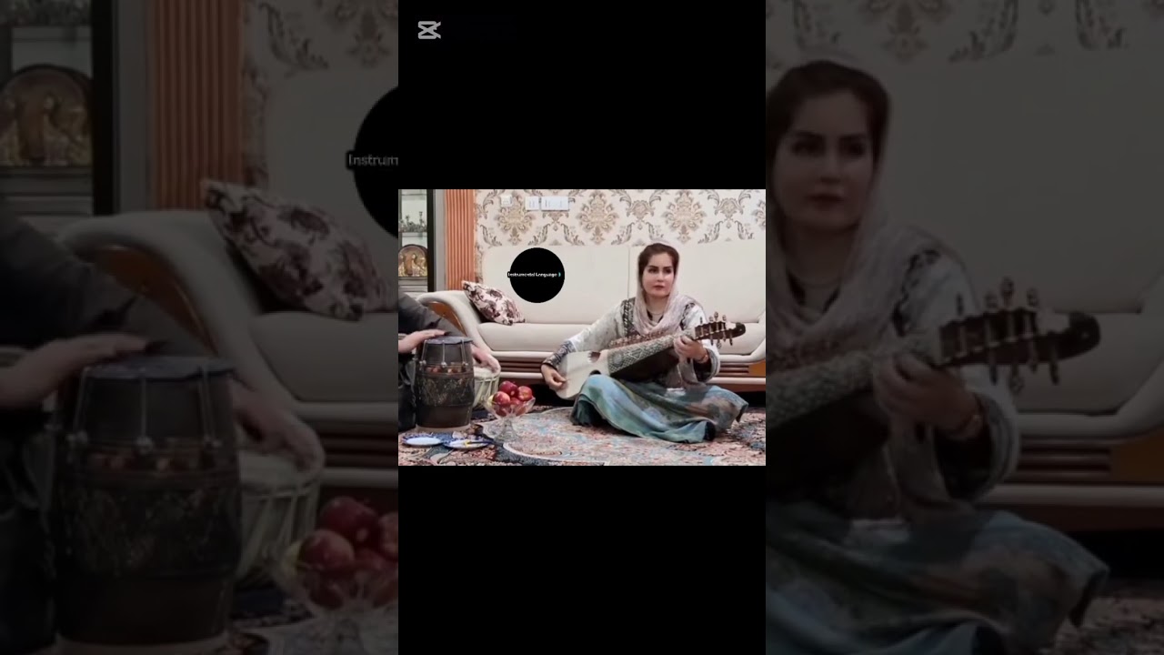 A beautiful Girl playing Rabab music #instrumentallanguage #rababmusic #music #worldmusic #song