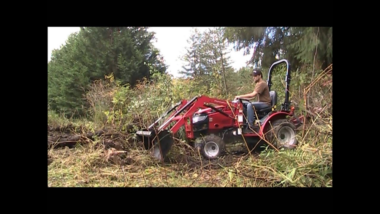 Mahindra Max  24, clearing  brush and other  shenanigans.