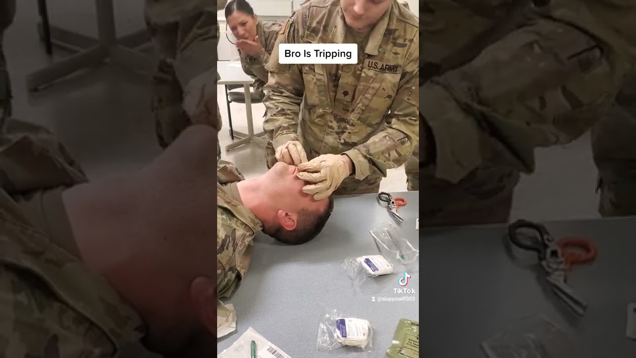 Bro is taking a breathing tube up the nose Combat Medic Training.