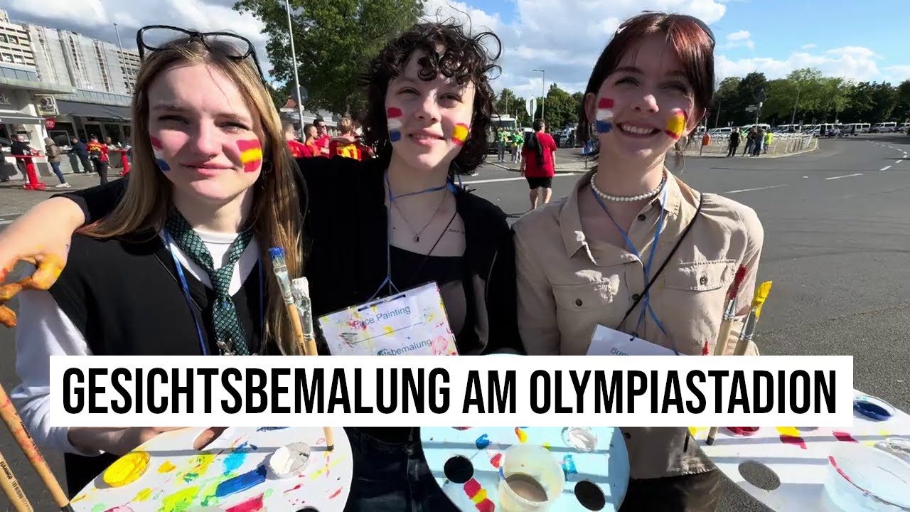 15.06.2024 Ukraine Flüchtlinge malen Fahnen auf Gesichter der EM-Fans am Olympiastadion Berlin