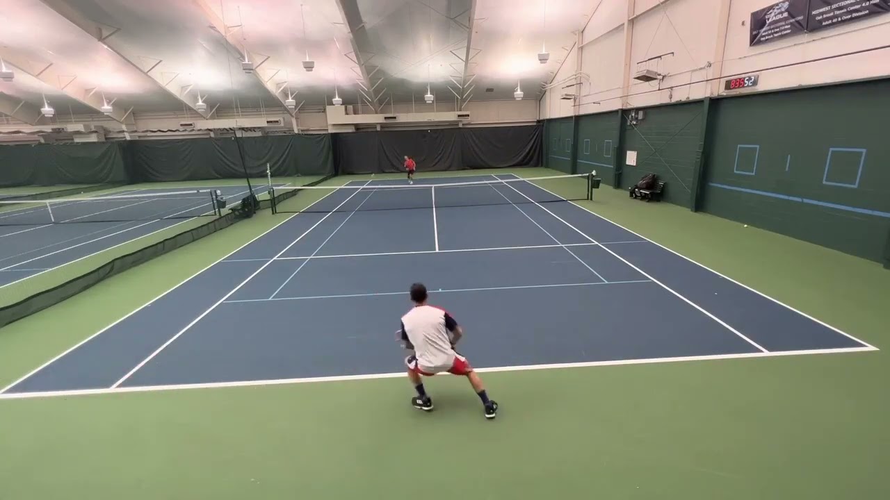 After deep ground strokes, finishing the point at the net with a Pete Sampras slam dunk smash! Vamos