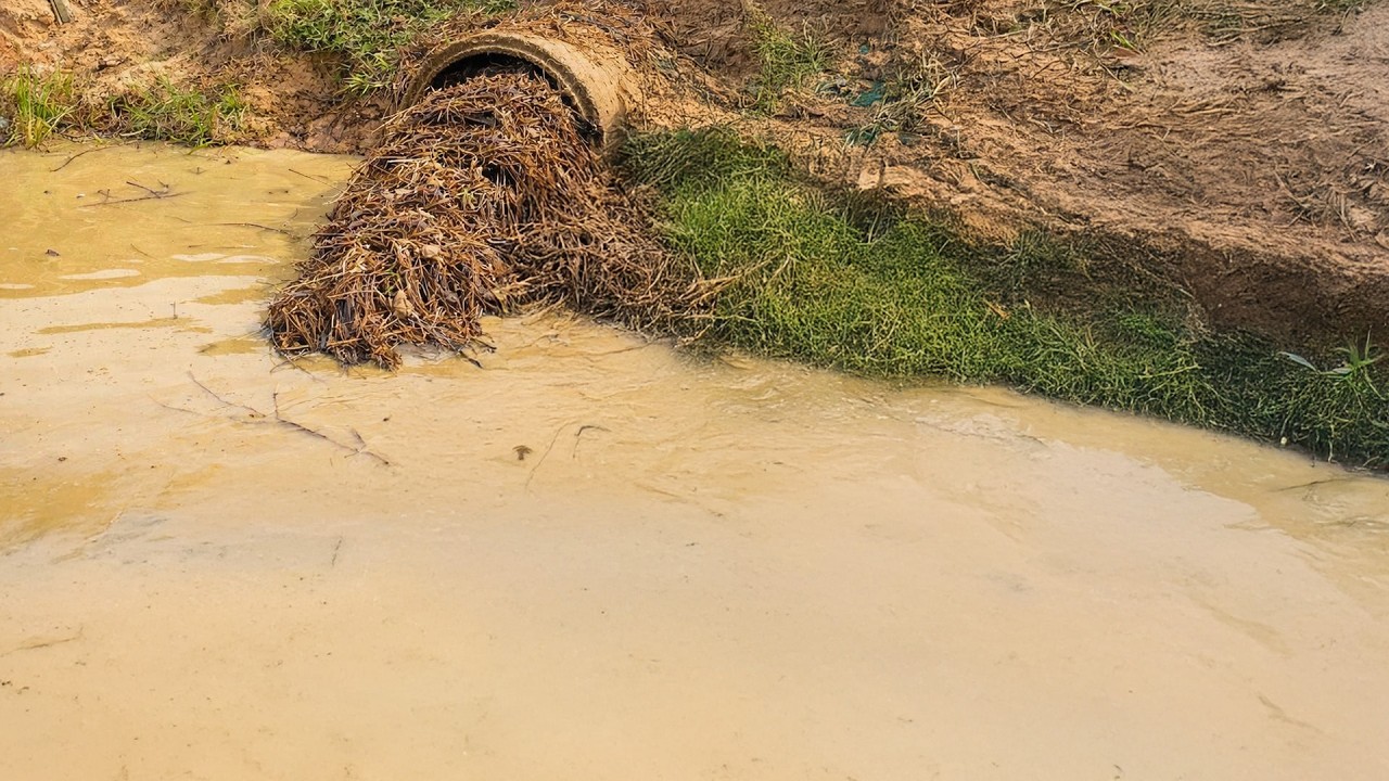 Mud & Debris Completely Sealed This Culvert!