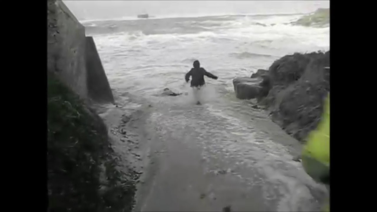 Elderly couple almost swept out to sea.