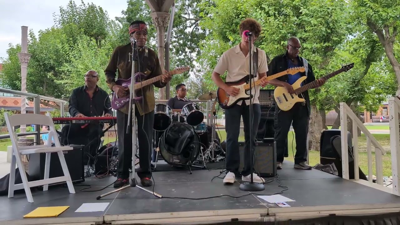 Mighty Michael performed Sweet Home Chicago by Robert Johnson with Billy Davis Rhythm Machine Band 