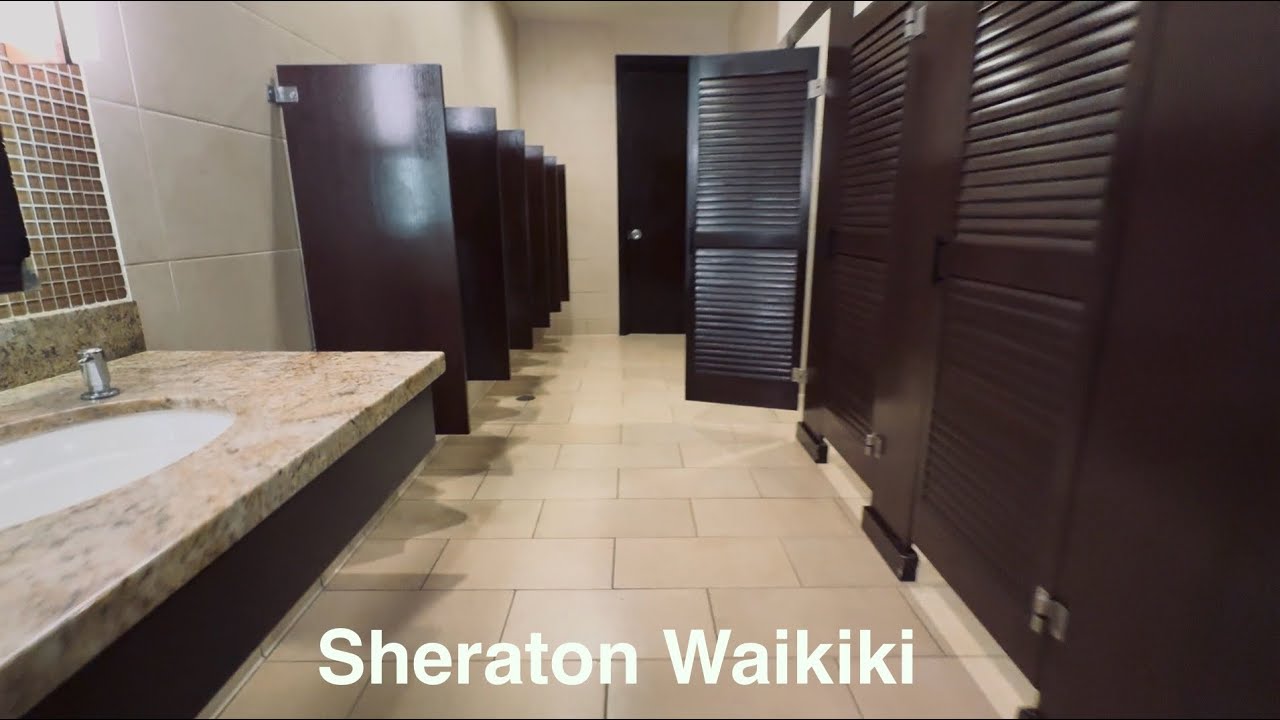 Kohler Bardon Urinal, Back Spud Kingston Toilet Flush, Toto Bidet | Sheraton Hotel Waikiki Restroom 
