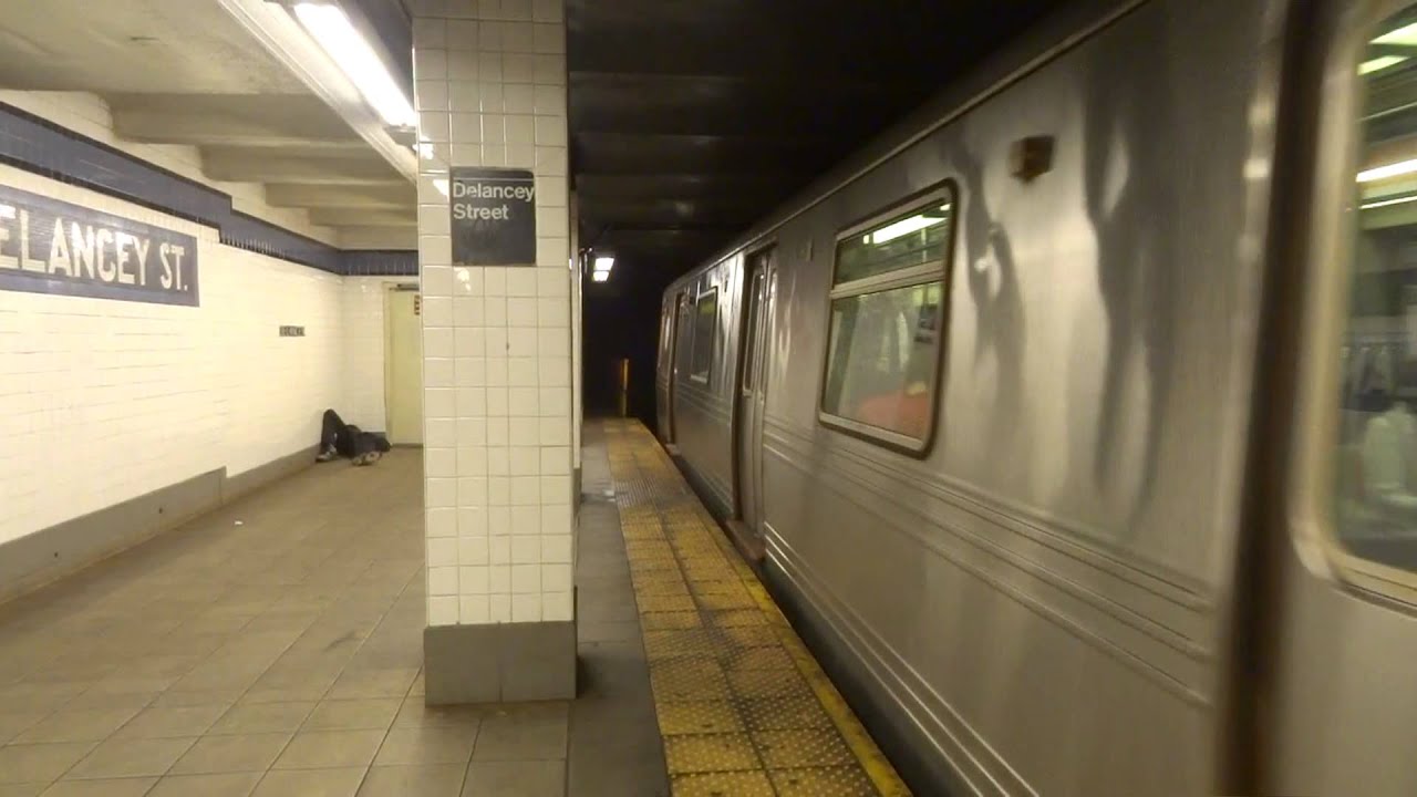NYC Subway: Jamaica-bound R46 (F) Entering & Leaving Delancey Street