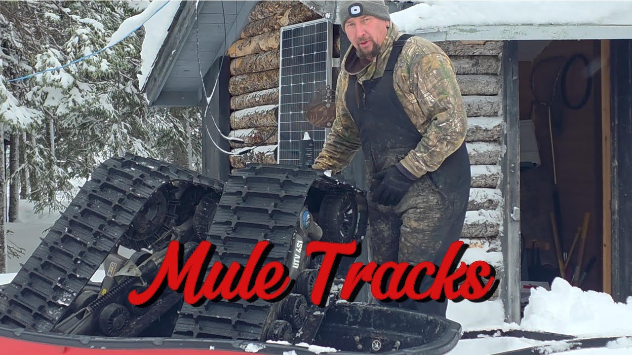 Off grid living in the woods, track install and a test ride. #offgridliving #newfoundlandlabrador