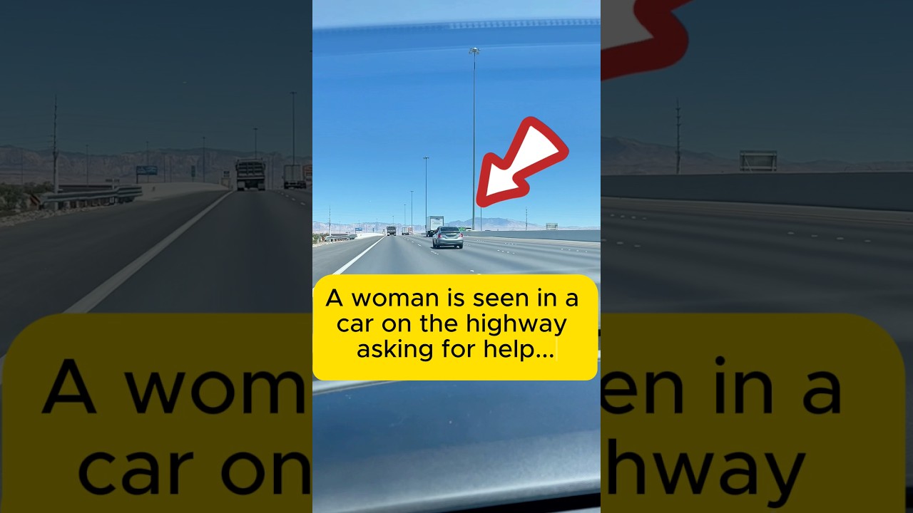 Una donna in pericolo chiede aiuto dall'auto in autostrada.