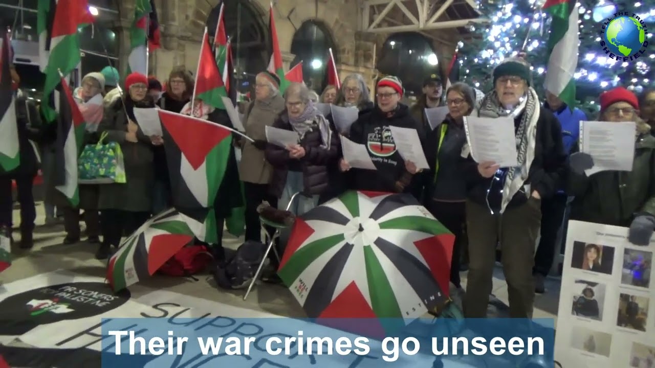 In the Bleak Midwinter with new words written by the Tadhamon Singers and sung in Sheffield Station