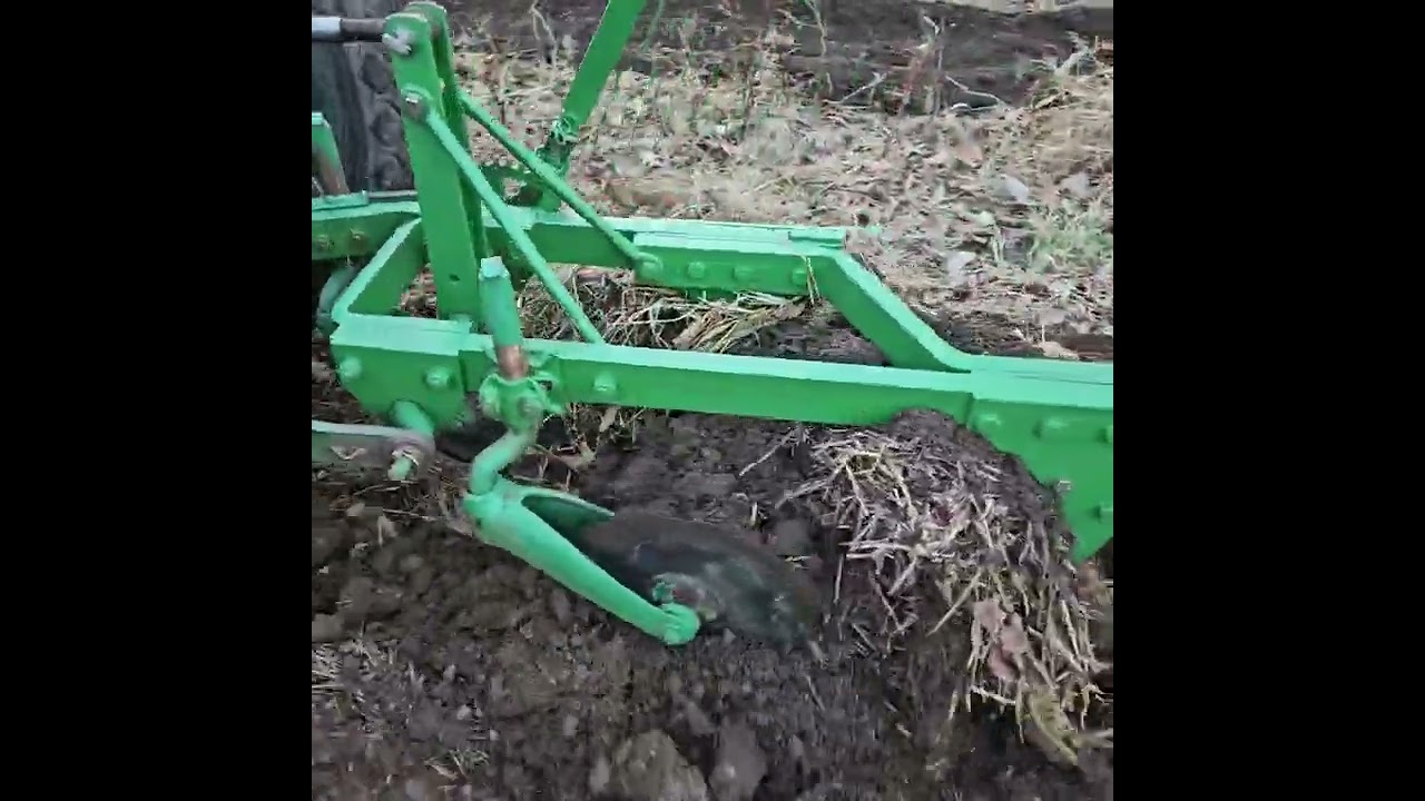 John Deere 950 plowing and harrowing