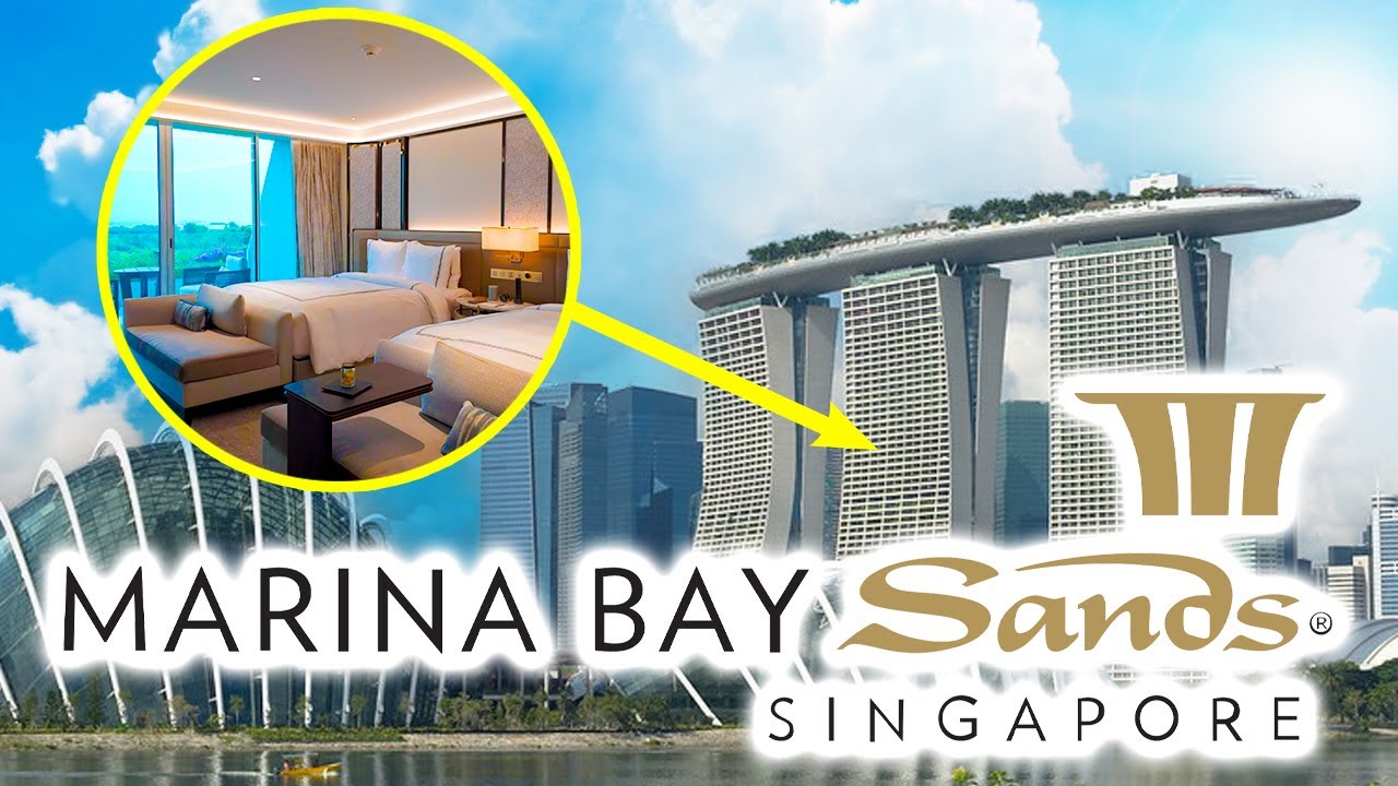 Экскурсия по номерам отеля Marina Bay Sands: улучшенный двухместный номер с кроватью размера «que...
